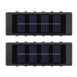 Set 2 x lampa de exterior decorativa cu incarcare solara NEXTLY, pentru perete/gard, senzor de lumina, 12 leduri sus-jos, lumina calda, rezistenta la apa, negru