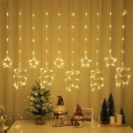 Instalatie de Craciun tip perdea NEXTLY, interconectabila, lumini LED Alb Cald, 8 jocuri de lumini, 3 metri latime, pentru interior/usa/geam/perete, telecomanda pe fir, conectare la priza, stele si reni, alb cald